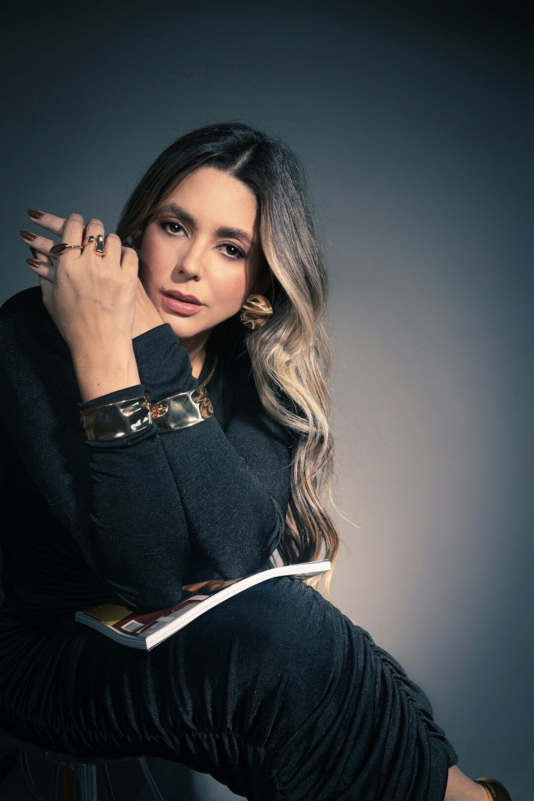 Studio portrait of a Latin American female entertainment reporter in her 30s